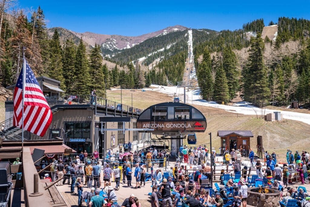 Agassiz Restaurant & Bar at Arizona Snowbowl with the Arizona Gondola and San Francisco Peaks in the background